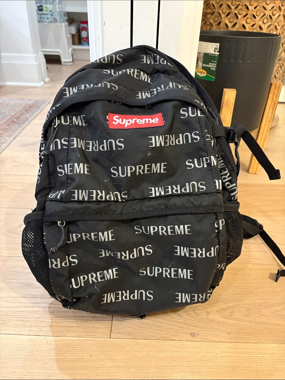Supreme Black All-Over Logo Backpack with Red Box Logo
